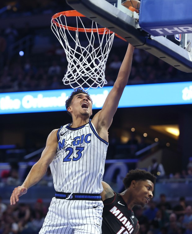 Orlando forward Tristan da Silva (23) scores over Miami forward...