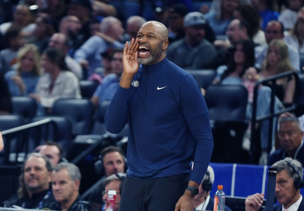 Orlando coach Jamahl Mosley yells during the Miami Heat at...