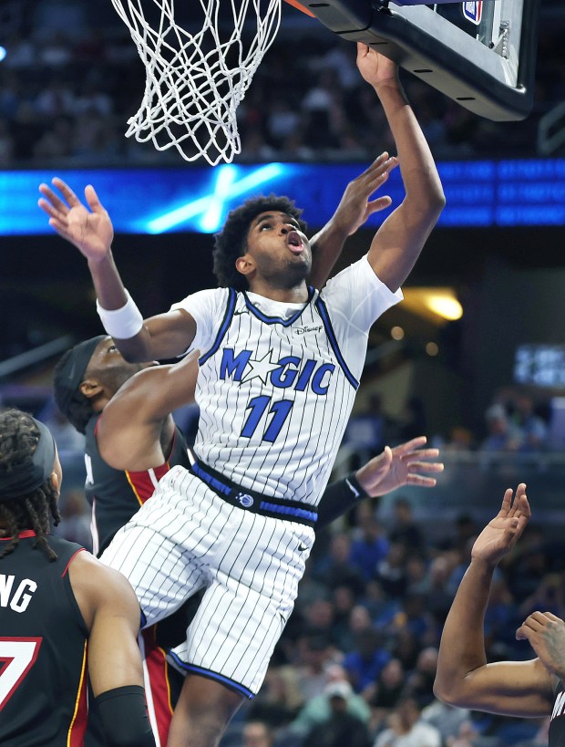 Orlando guard Jase Richardson (11) tips in a shot during...