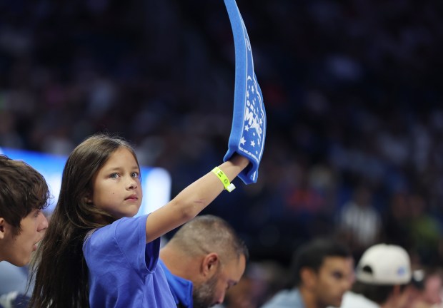 A young Orlando fan cheers during the Miami Heat at...