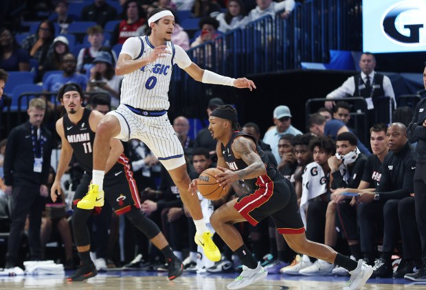 Orlando guard Anthony Black (0) leaps to defend during the...