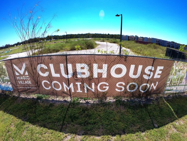 Signage at the Magic Village construction site in Kissimmee advertises...