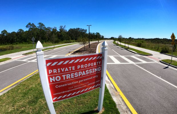 A no trespassing sign welcomes visitors at “Life Is Beautiful...