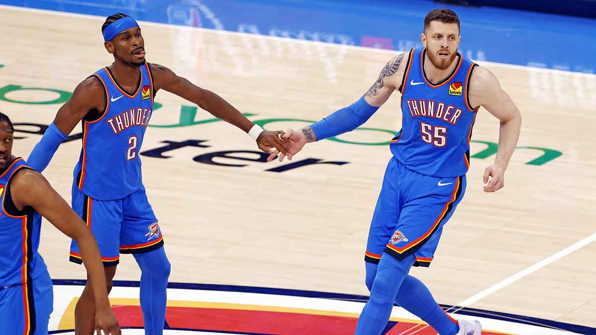 Thunder guard Shai Gilgeous-Alexander (2) and center Isaiah Hartenstein (55) celebrate during the first quarter against the Minnesota Timberwolves in game five of the western conference finals for the 2025 NBA Playoffs at Paycom Center