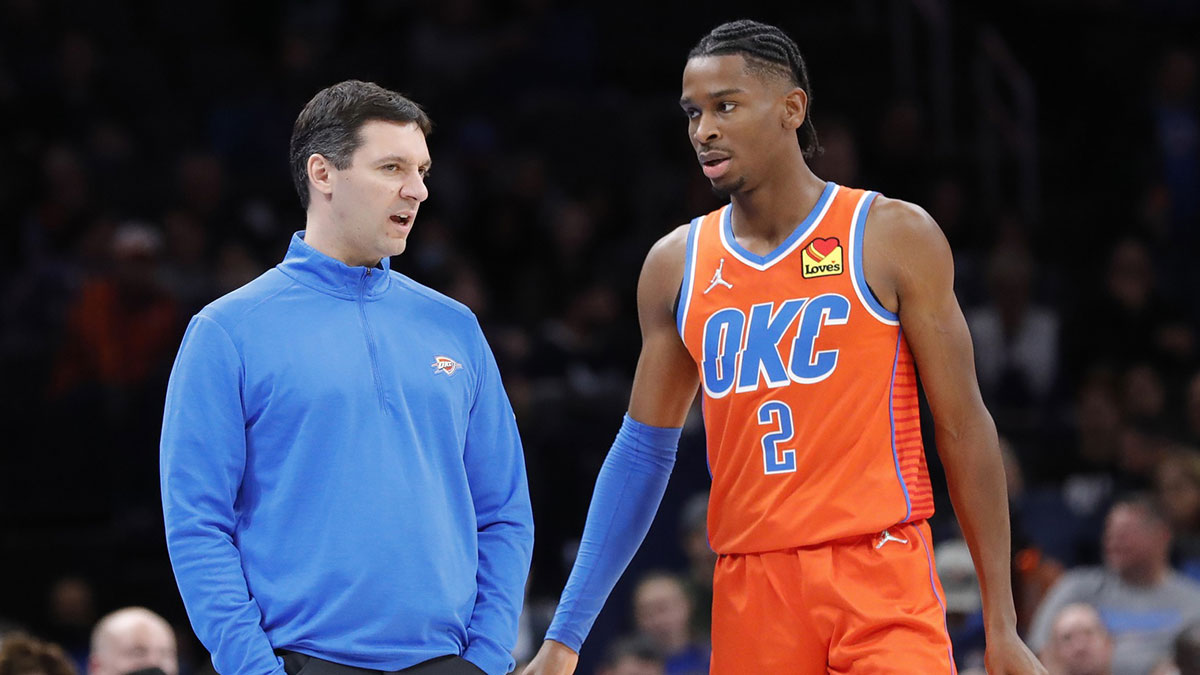 Thunder head coach Mark Daigneault talks with Oklahoma City Thunder guard Shai Gilgeous-Alexander (2) between plays against the Dallas Mavericks in the second half at Paycom Center. Dallas won 103-84