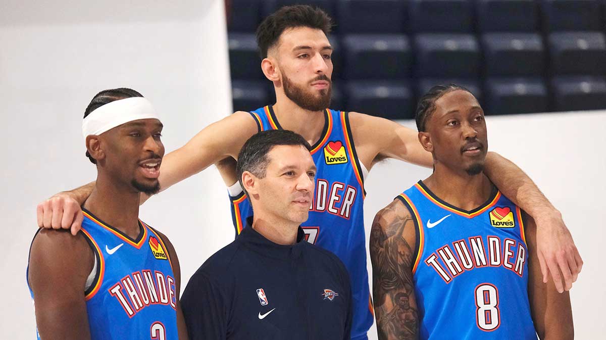 Shai Gilgeous-Alexander (2) Coach Mark Daigneault, Chet Holmgren (7) and Jalen Williams (8) during the Thunder Media Day for the 25-26 NBA season at the Paycom Center Monday, Sept. 29, 2025.