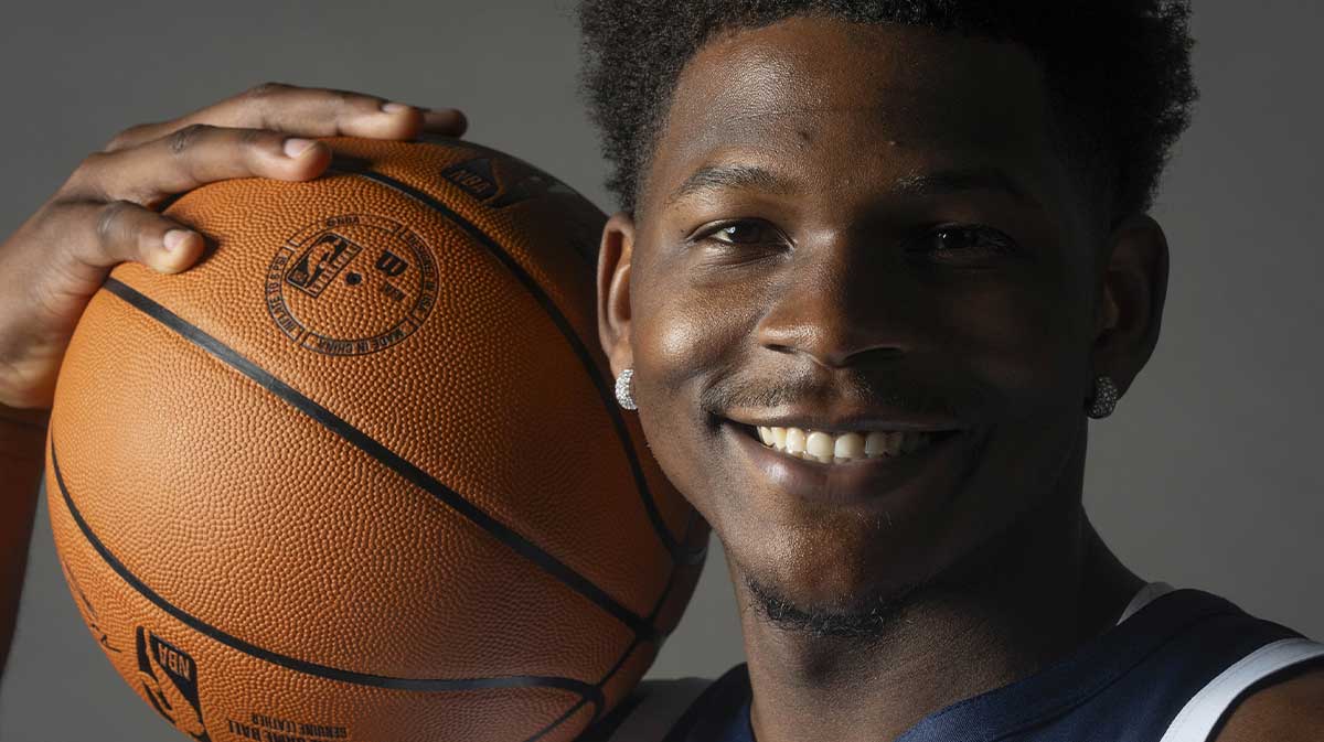 Timberwolves guard Anthony Edwards (5) poses for a photograph as part of media day at Target Center