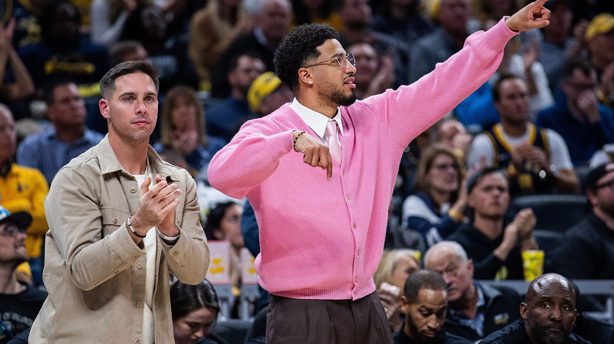 Tyrese Haliburton watching the Indiana Pacers' season opener game against the Oklahoma City Thunder.