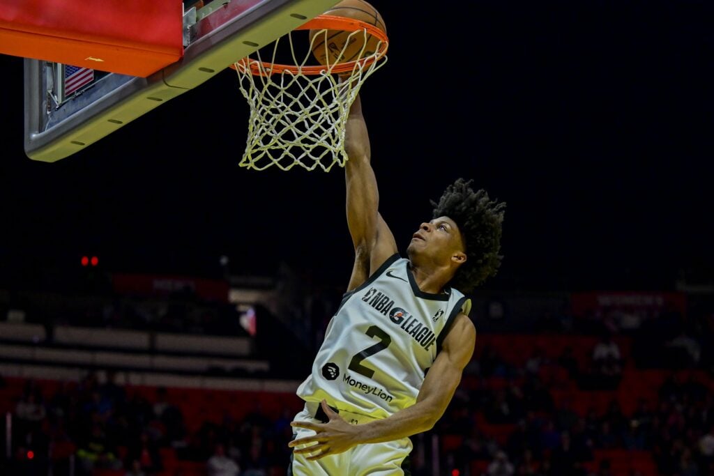 Feb 19, 2023; Salt Lake City, UT, USA; Team Scoot guard London Johnson (2) makes a slam dunk against Team Luka during the second half at the Jon M. Huntsman Center. Mandatory Credit: Christopher Creveling-USA TODAY Sports
