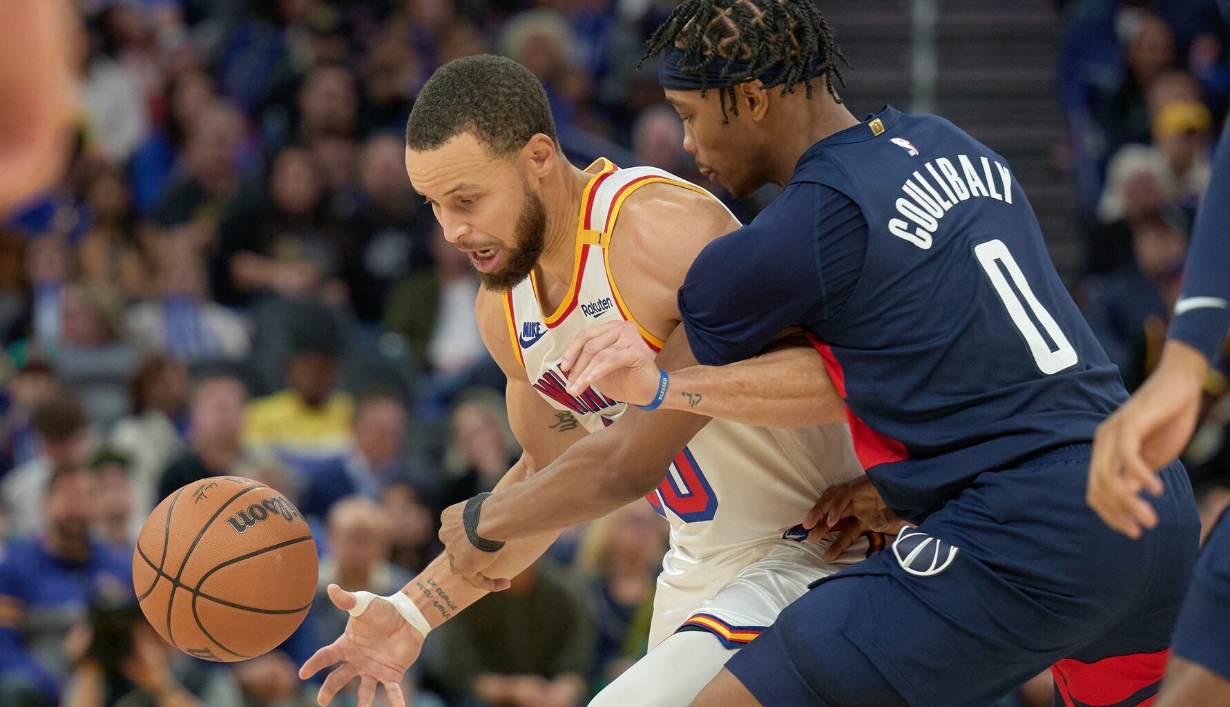 Washington Wizards wing Bilal Coulibaly guarding Golden State Wizards guard Stephen Curry