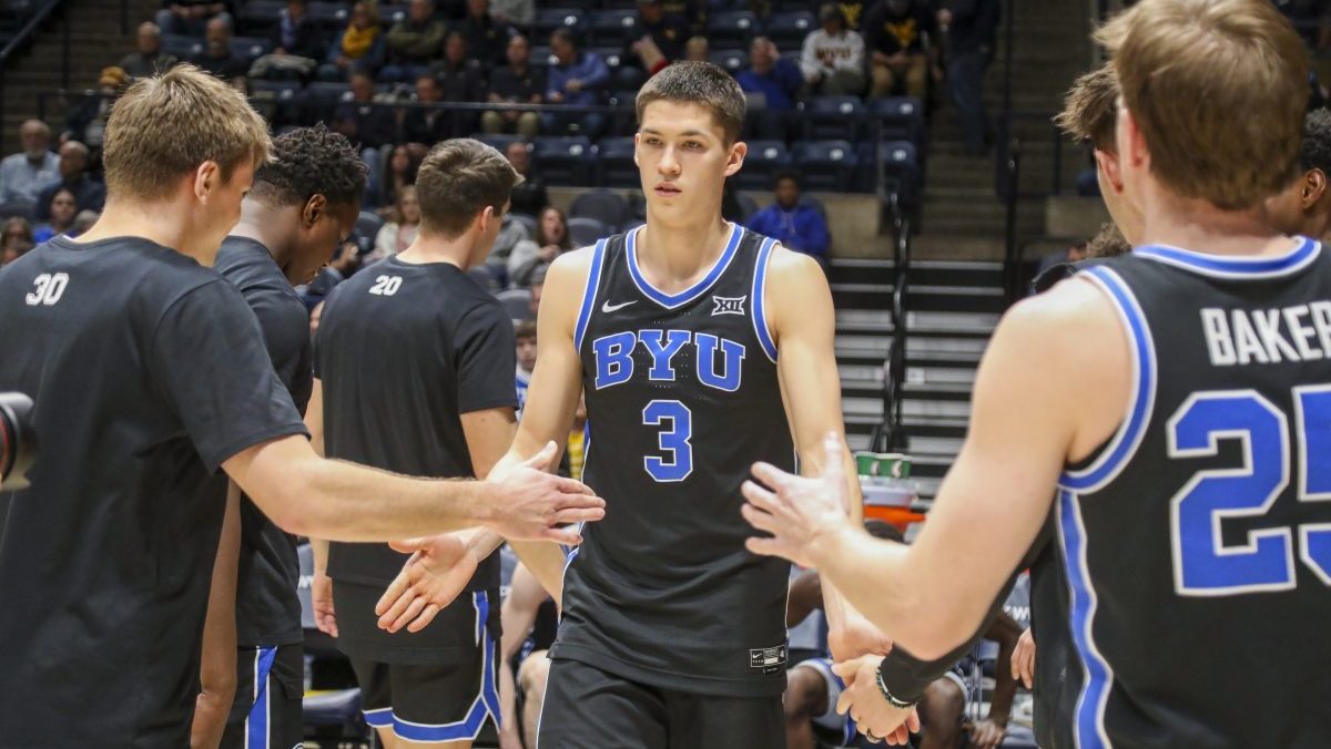 Brigham Young Cougars guard Egor Demin (3) is introduced before their game against the West Virginia Mountaineers at WVU Coliseum. Mandatory Credit: Ben Queen-Imagn Images