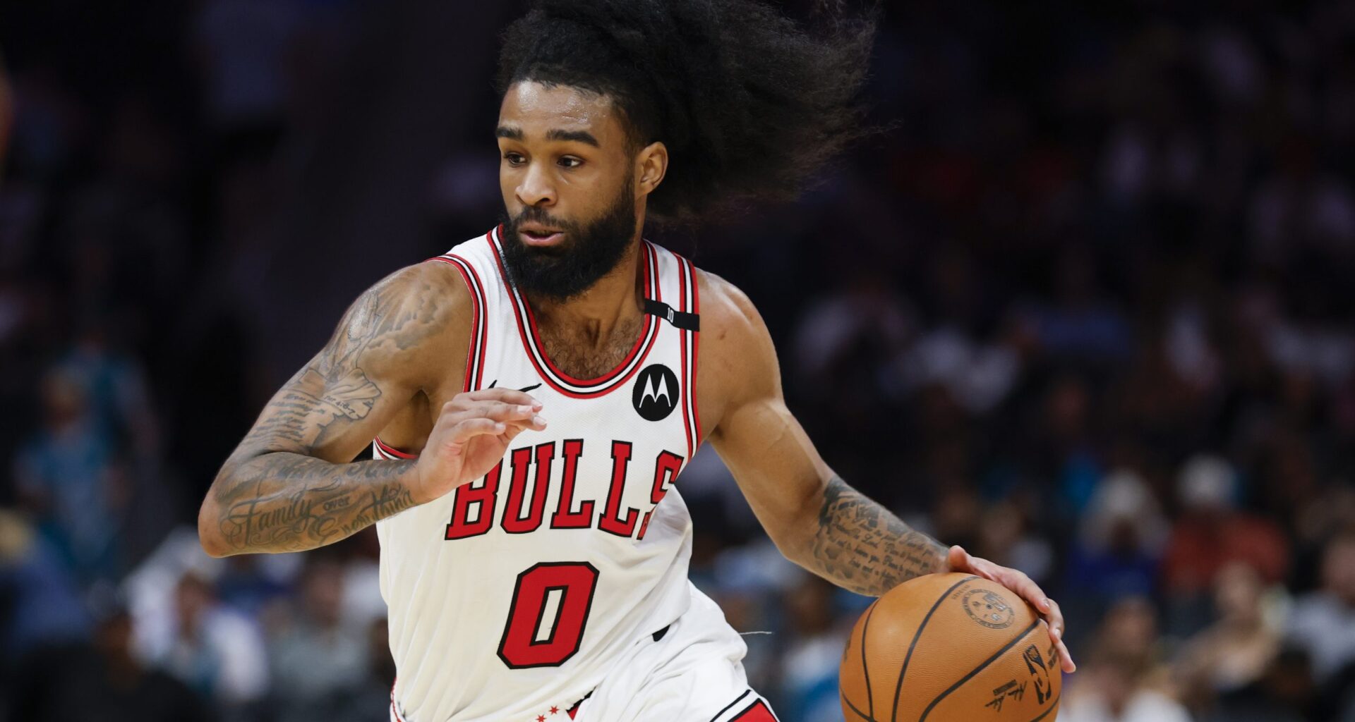 Chicago Bulls guard Coby White (0) drives to the basket against the Charlotte Hornets during the second half at Spectrum Center.