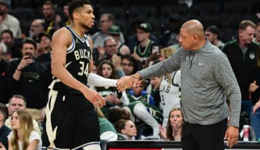 Bucks star Giannis Antetokounmpo high fives Doc Rivers during the 2024-25 NBA Playoffs.