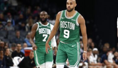 Boston Celtics guard Derrick White in front of teammate Jaylen Brown