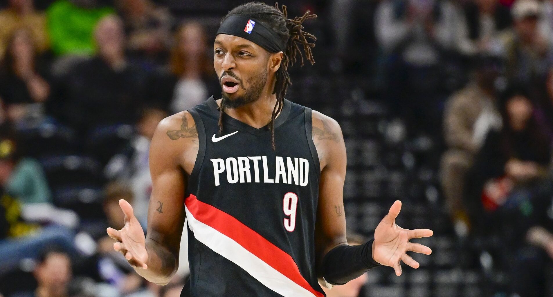 Oct 16, 2025; Salt Lake City, Utah, USA; Portland Trail Blazers forward Jerami Grant (9) questions a call during the second half against the Utah Jazz at Delta Center. Mandatory Credit: Peter Creveling-Imagn Images