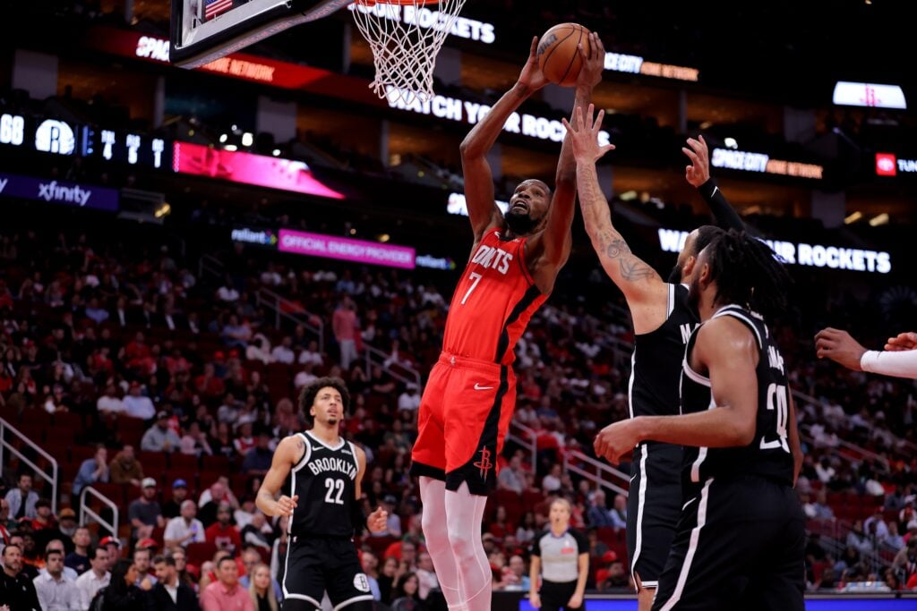 Oct 27, 2025; Houston, Texas, USA; Houston Rockets forward Kevin Durant (7) rebounds against the Brooklyn Nets during the third quarter at Toyota Center. Mandatory Credit: Erik Williams-Imagn Images