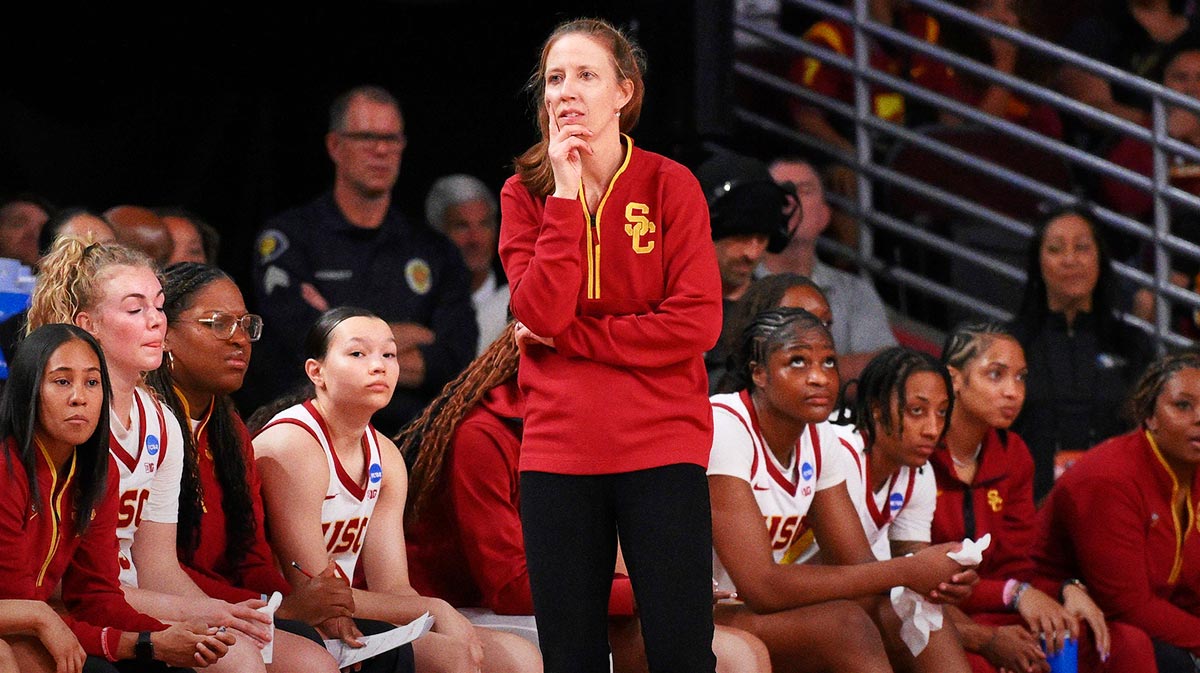 Isaiah Elohim, USC logo on left side, FAU logo on right side, fire symbols