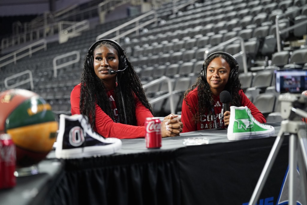 South Dakota players talk with the media at the 2025 Summit League media day event in October 2025.