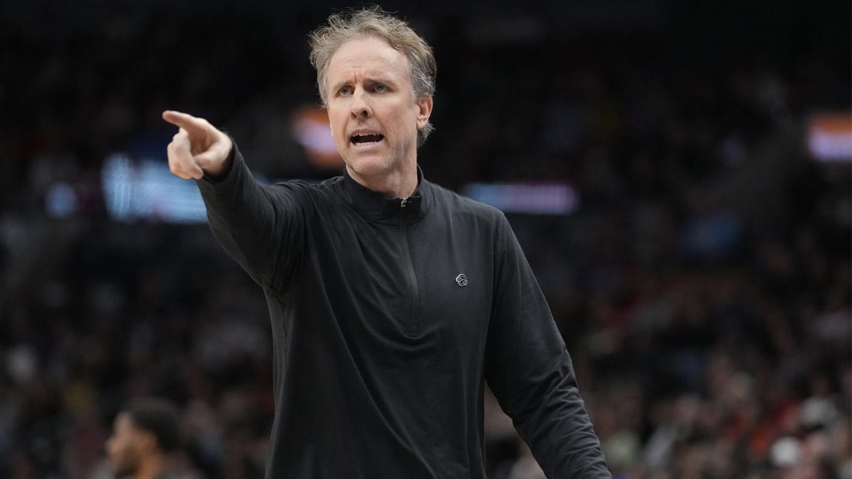 Washington Wizards head coach Brian Keefe calls out instructions to his players during the second half against the Toronto Raptors at Scotiabank Arena.