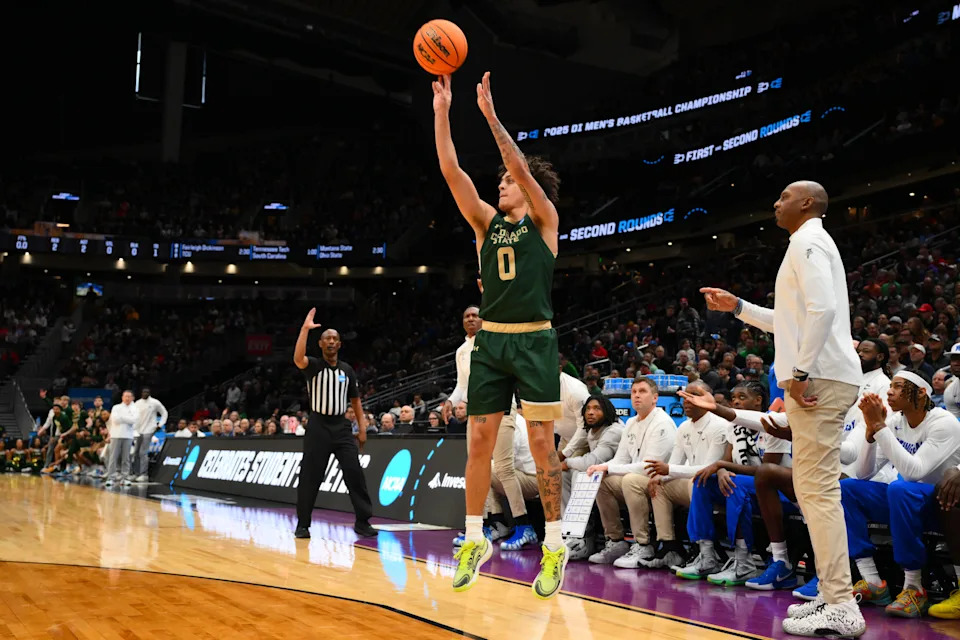 Mar 21, 2025; Seattle, WA, USA; Colorado State Rams guard Kyan Evans (0) shoots a three pointer during the first half against Memphis Tigers at Climate Pledge Arena. Mandatory Credit: Steven Bisig-Imagn Images