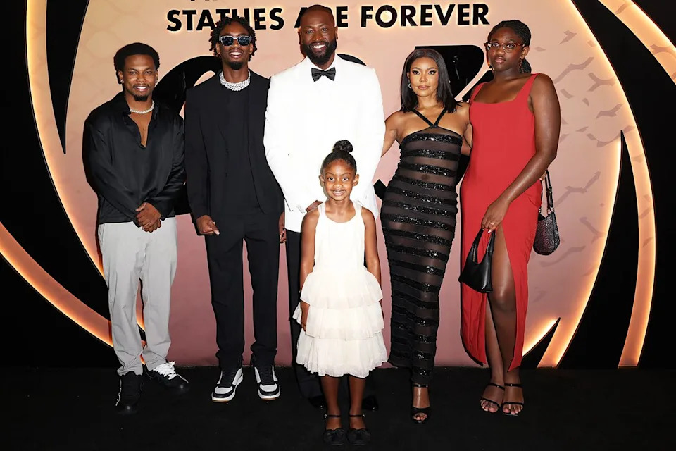 Alexander Tamargo/Getty Dwyane Wade and Gabrielle Union pose with their family in October 2024.