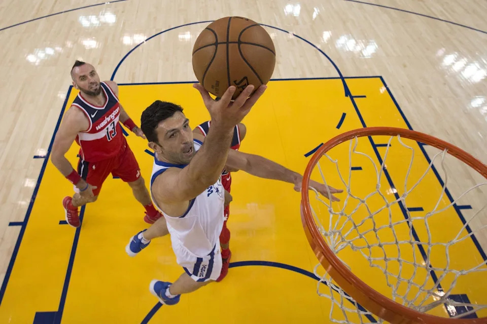 October 27, 2017; Oakland, CA, USA; Golden State Warriors center Zaza Pachulia (27) shoots the basketball against Washington Wizards center Marcin Gortat (13) during the first half at Oracle Arena. The Warriors defeated the Wizards 120-117. Mandatory Credit: Kyle Terada-USA TODAY Sports