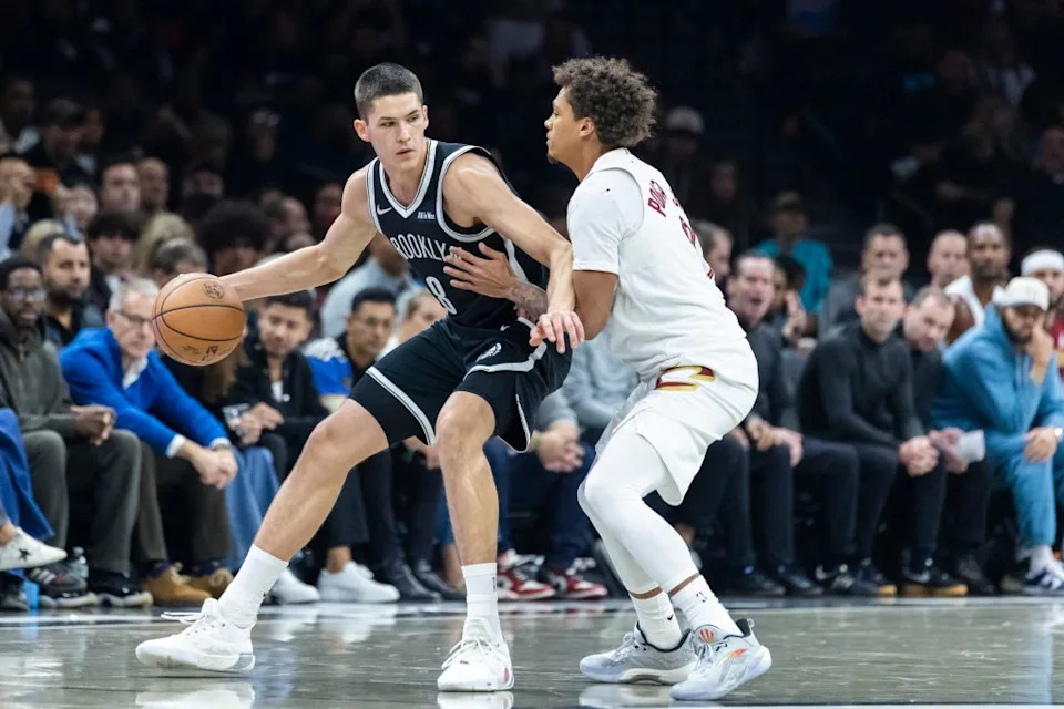 Brooklyn Nets guard Egor Demin (8) drives into Cleveland Cavaliers guard Craig Porter Jr. (9). Corey Sipkin for the NY POST