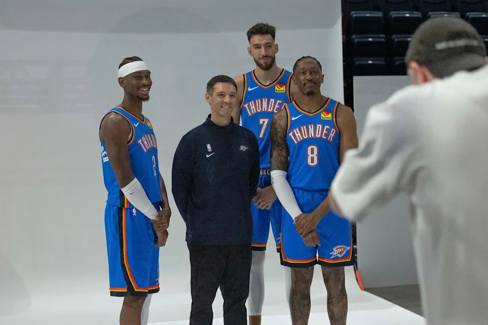 Sep 29, 2025; Oklahoma City, OK, USA; Oklahoma City Thunder guard Shai Gilgeous-Alexander (2), head coach Mark Daigneault, forward Chet Holmgren (7) and forward Jalen Williams (8) poses for a photo during the 2025 Oklahoma City Thunder media day at Paycom Center. Mandatory Credit: Alonzo Adams-Imagn Images