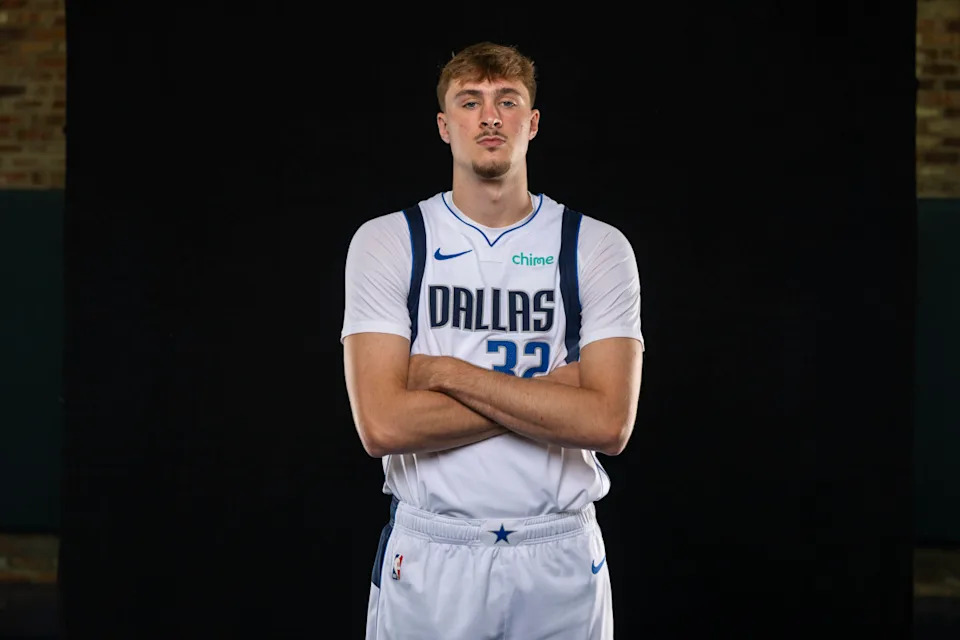 Dallas Mavericks rookie Cooper Flagg (32) poses for a photo during the Mavericks 2025 media day.Jerome Miron-Imagn Images
