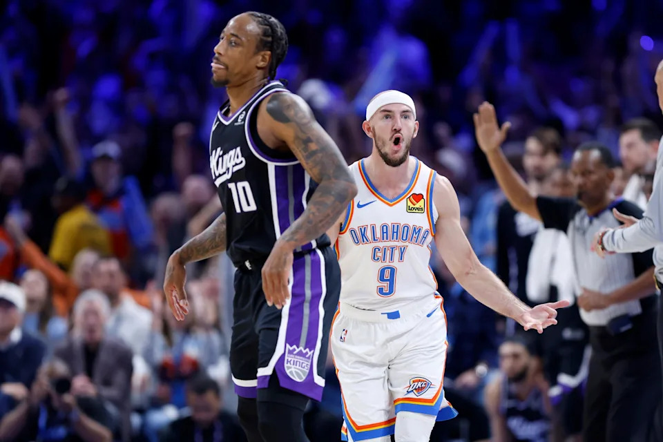 Oklahoma City Thunder guard Alex Caruso (9) celebrates a 3-pointer beside Sacramento Kings guard DeMar DeRozan (10) during an NBA game between the Oklahoma City Thunder and the Sacramento Kings at Paycom Center in Oklahoma City, Tuesday, Oct. 28, 2025. The Thunder win 107-101.