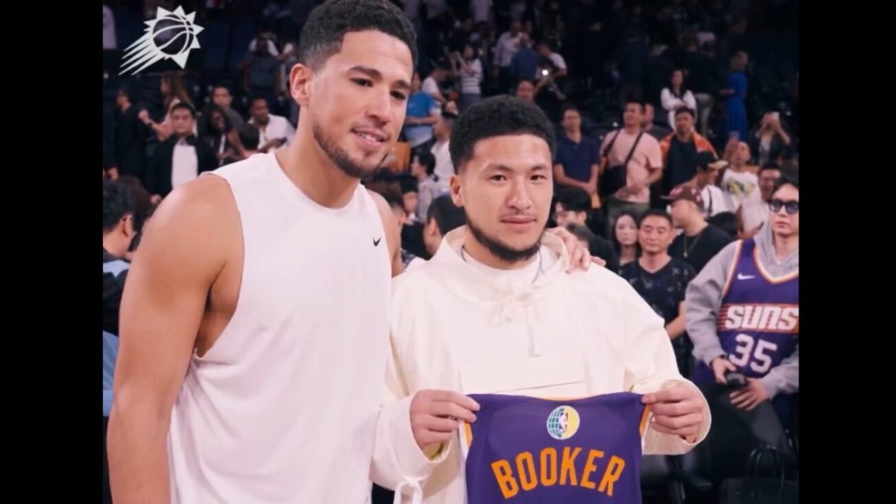 Screenshot of Phoenix Suns star Devin Booker posing with China Book....