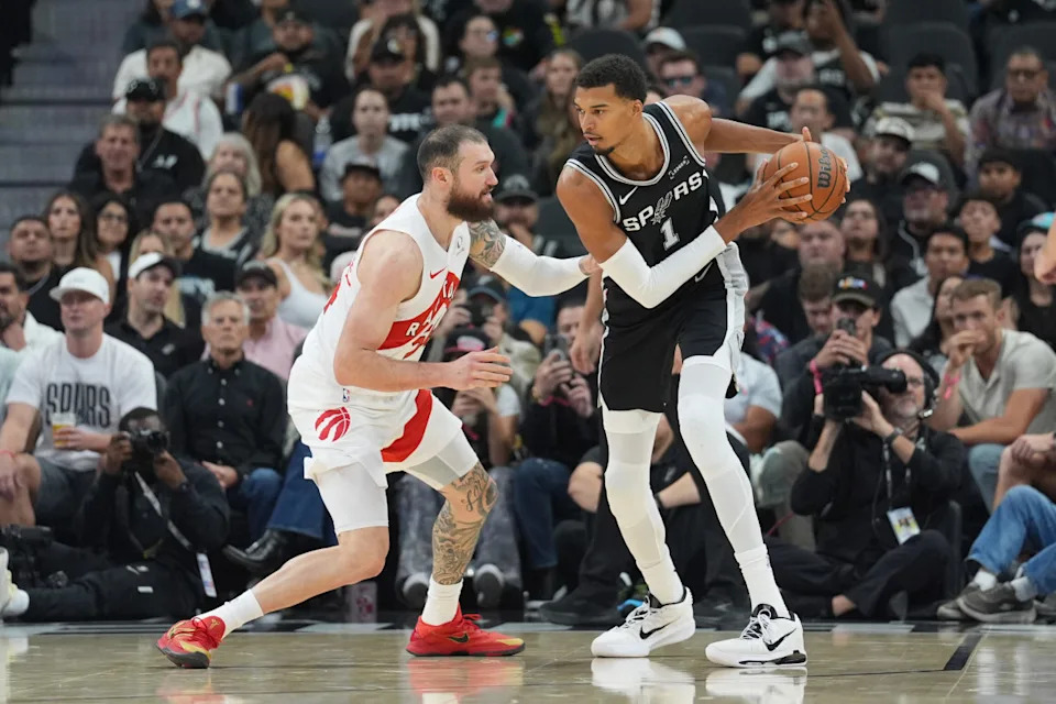 San Antonio Spurs forward/center Victor Wembanyama (1) faces off against Toronto Raptors forward/center Sandro Mamukelashvili (54)Daniel Dunn-Imagn Images