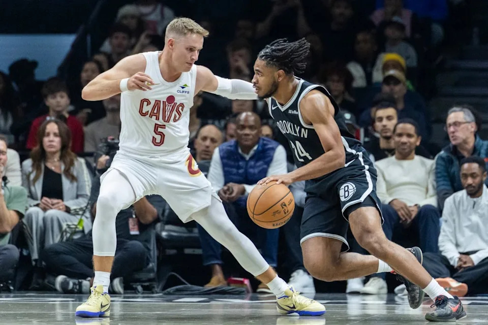 Brooklyn Nets guard Cam Thomas (24) drives around Cleveland Cavaliers guard Sam Merrill (5) in the first half at Barclays Center, Friday, Oct. 24, 2025, in Brooklyn, NY. Corey Sipkin for the NY POST