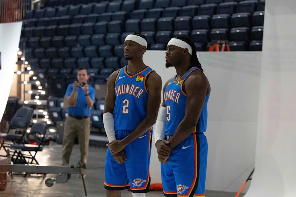 Sep 29, 2025; Oklahoma City, OK, USA; Oklahoma City Thunder guard Shai Gilgeous-Alexander (2) and guard Luguentz Dort (5) poses for a photo during the 2025 Oklahoma City Thunder media day at Paycom Center. Mandatory Credit: Alonzo Adams-Imagn Images