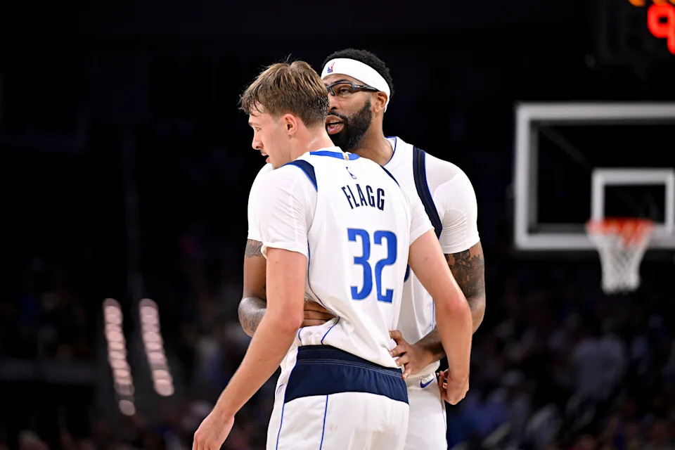 Oct 6, 2025; Fort Worth, Texas, USA; Dallas Mavericks forward/center Anthony Davis (3) talks with forward Cooper Flagg (32) during the second quarter at Dickie's Arena. Mandatory Credit: Jerome Miron-Imagn Images