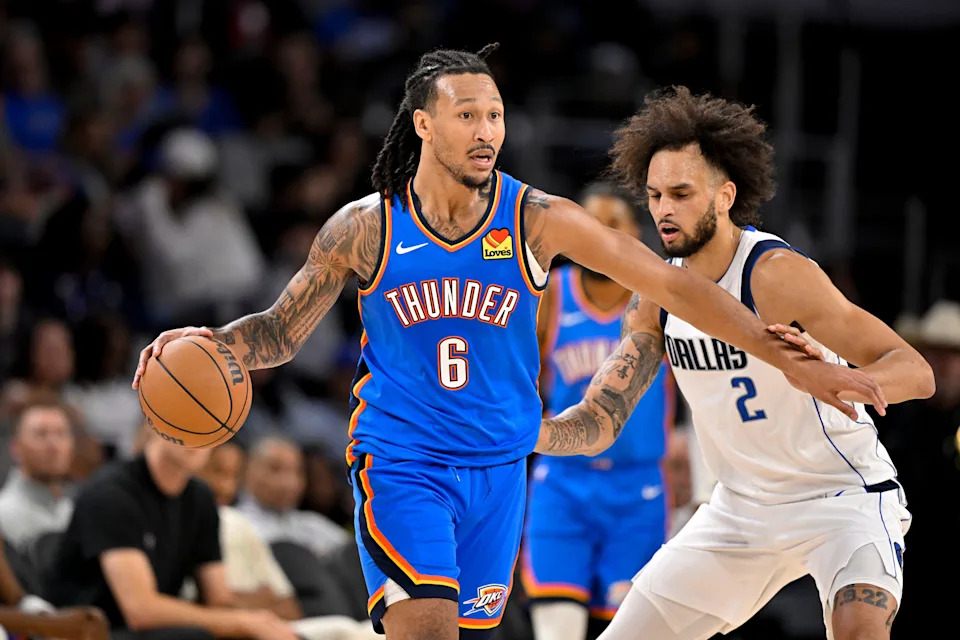 Oct 6, 2025; Fort Worth, Texas, USA; Oklahoma City Thunder forward Jaylin Williams (6) looks to move the ball past Dallas Mavericks center Dereck Lively II (2) during the second quarter at Dickie's Arena. Mandatory Credit: Jerome Miron-Imagn Images