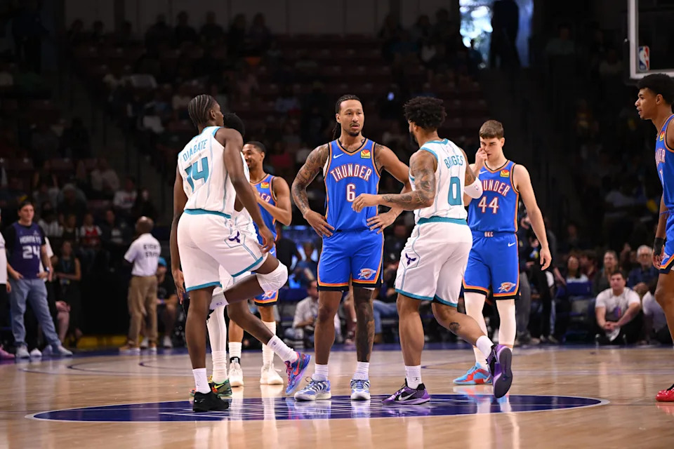 Oct 5, 2025; North Charleston, South Carolina, USA; Oklahoma City Thunder forward Jaylin Williams (6) greets Charlotte Hornets forward Miles Bridges (0) at tip-off at North Charleston Coliseum. Mandatory Credit: Arthur Ellis-Imagn Images