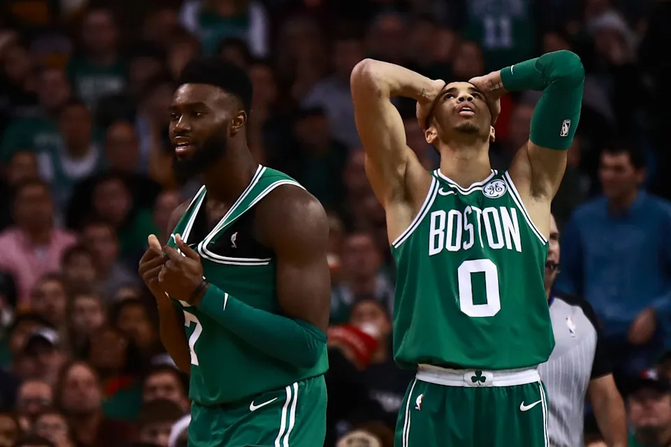 BOSTON, MA - DECEMBER 25: Jayson Tatum #0 and Jaylen Brown #7 of the Boston Celtics react after a call from the official during the fourth quarter of the game against the Washington Wizards at TD Garden on December 25, 2017 in Boston, Massachusetts. NOTE TO USER: User expressly acknowledges and agrees that, by downloading and or using this photograph, User is consenting to the terms and conditions of the Getty Images License Agreement. (Photo by Omar Rawlings/Getty Images)