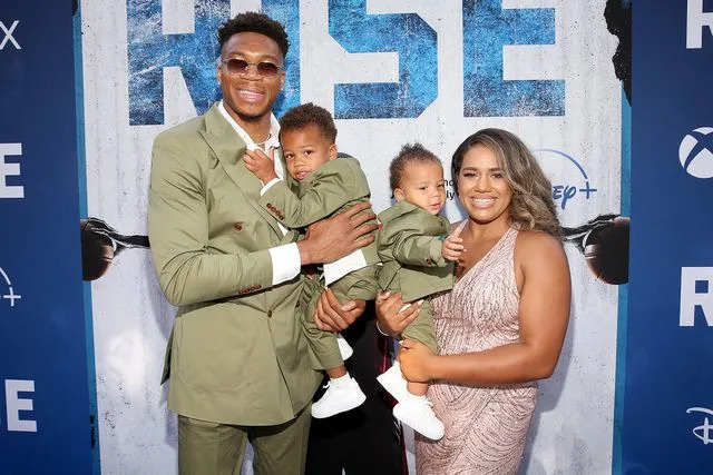 Jesse Grant/Getty  Giannis Antetokounmpo and Mariah Riddlesprigger with their kids.