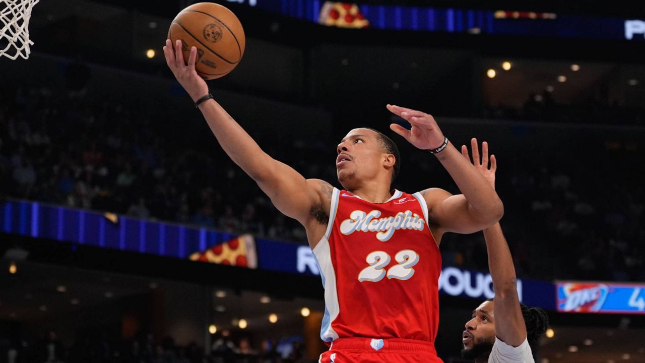 FILE - Memphis Grizzlies guard Desmond Bane (22) shoots the ball past Oklahoma City Thunder guard Isaiah Joe (11) during the first half in Game 4 of an NBA first-round playoff series, April 26, 2025, in Memphis, Tenn. (AP Photo/George Walker IV, File)