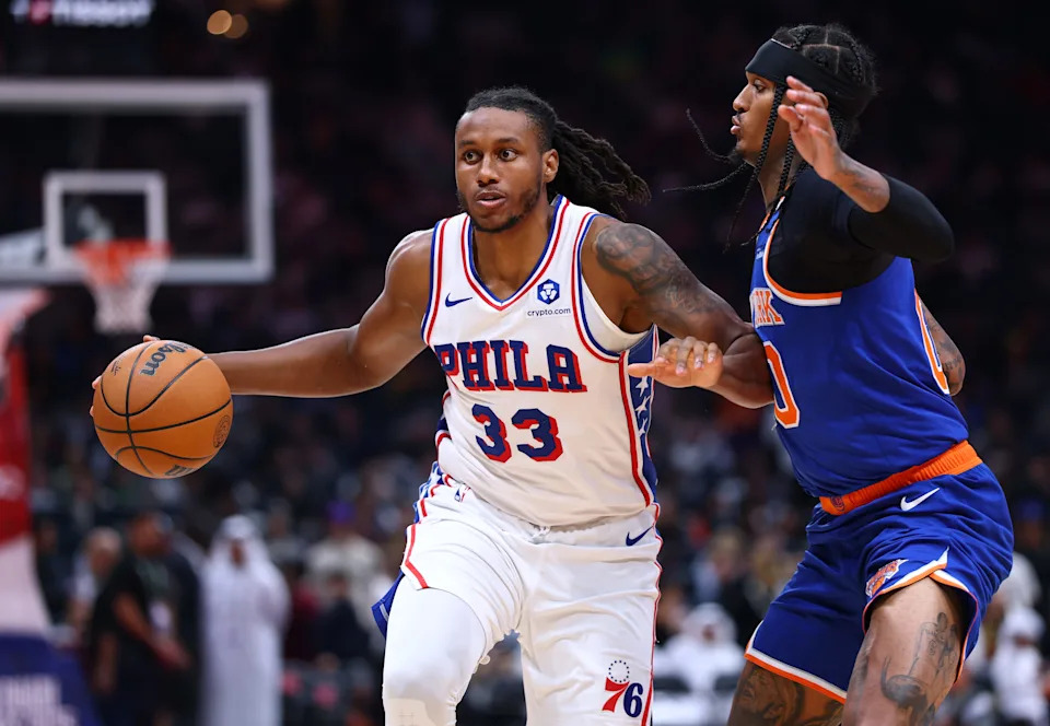 ABU DHABI, UNITED ARAB EMIRATES - OCTOBER 04: Jabari Walker #33 of Philadelphia 76ers dribbles the ball past Jordan Clarkson #00 of New York Knicks during a preseason game between Philadelphia 76ers and New York Knicks on October 04, 2025 in Abu Dhabi, United Arab Emirates. (Photo by Francois Nel/Getty Images)