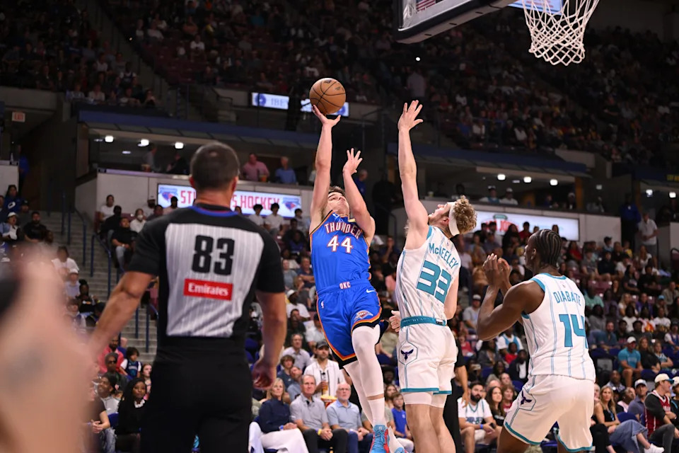 Oct 5, 2025; North Charleston, South Carolina, USA; Oklahoma City Thunder guard Nikola Topic (44) puts up a shot against the Charlotte Hornets in the first quarter at North Charleston Coliseum. Mandatory Credit: Arthur Ellis-Imagn Images