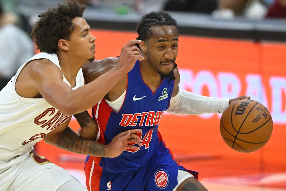 Oct 14, 2025; Cleveland, Ohio, USA; Cleveland Cavaliers guard Craig Porter Jr. (9) defends Detroit Pistons guard Daniss Jenkins (24) in the second quarter at Rocket Arena. Mandatory Credit: David Richard-Imagn Images