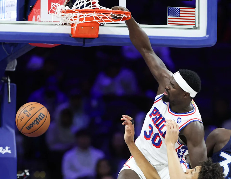 Oct 17, 2025; Philadelphia, Pennsylvania, USA; Philadelphia 76ers forward Adem Bona (30) dunks the ball against the Minnesota Timberwolves during the second quarter at Xfinity Mobile Arena. Mandatory Credit: Bill Streicher-Imagn Images