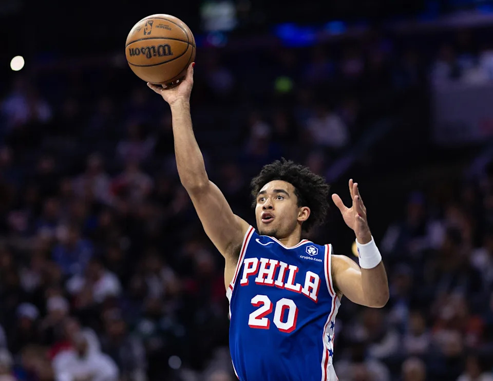 Dec 4, 2024; Philadelphia, Pennsylvania, USA; Philadelphia 76ers guard Jared McCain (20) shoots the ball against the Orlando Magic during the third quarter at Wells Fargo Center. Mandatory Credit: Bill Streicher-Imagn Images