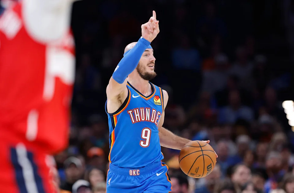 Oct 30, 2025; Oklahoma City, Oklahoma, USA; Oklahoma City Thunder guard Alex Caruso (9) gestures as he dribbles down the court against the Washington Wizards during the second half at Paycom Center. Mandatory Credit: Alonzo Adams-Imagn Images
