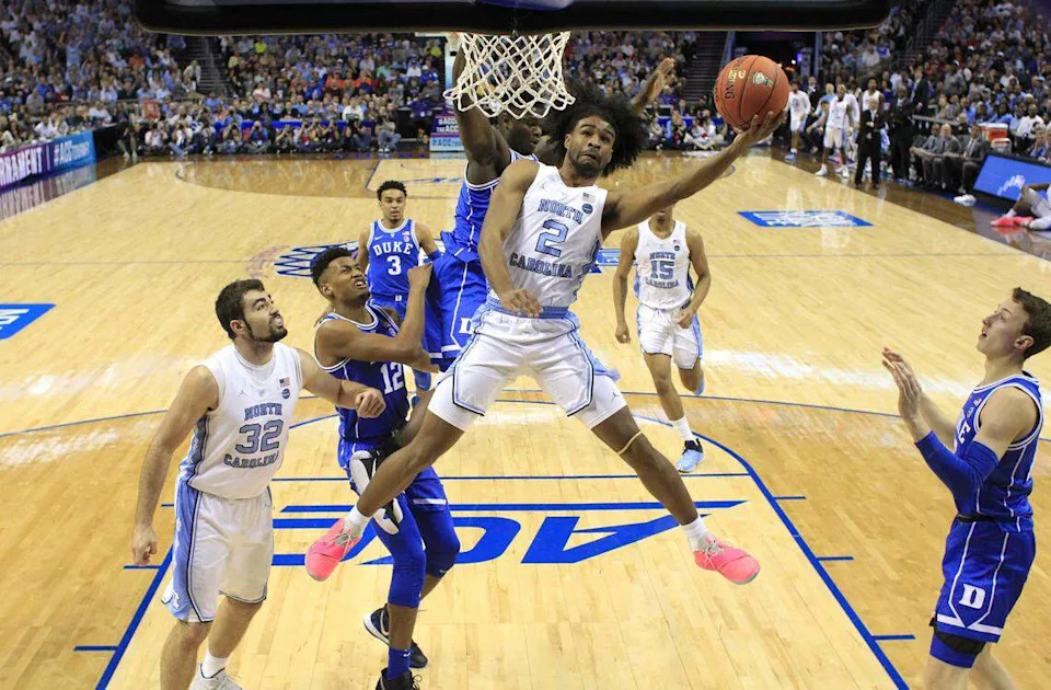 March 15, 2019: North Carolina's Coby White (2) shoots in the first half of Duke's 74-73 victory over UNC in the semifinals of the 2019 ACC Tournament in Charlotte.