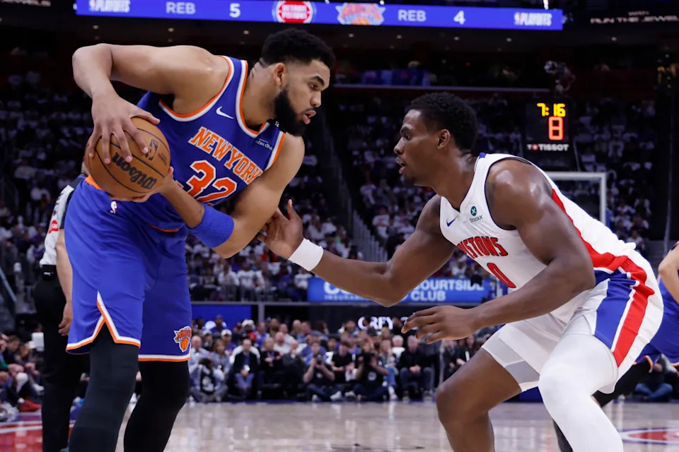 May 1, 2025; Detroit, Michigan, USA; New York Knicks center Karl-Anthony Towns (32) is defended by Detroit Pistons center Jalen Duren (0) in the first half during game six of first round for the 2024 NBA Playoffs at Little Caesars Arena. Credit: Rick Osentoski-Imagn Images