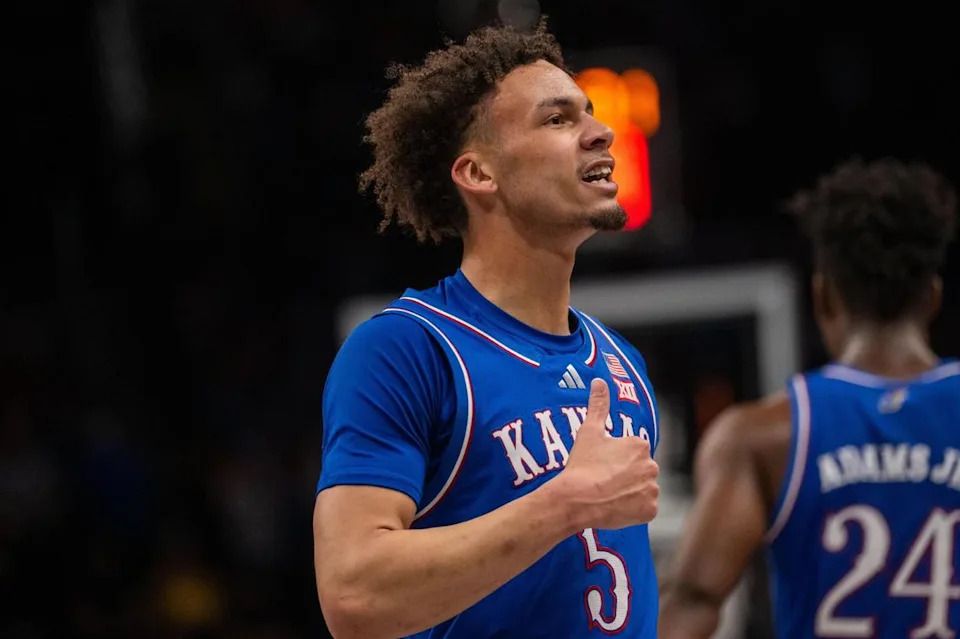 Kansas Jayhawks guard Zeke Mayo celebrated after hitting a 3-pointer in the second half of the Big 12 Championship quarterfinal game vs. the Arizona Wildcats on March 13, 2025 at T-Mobile Center in Kansas City.