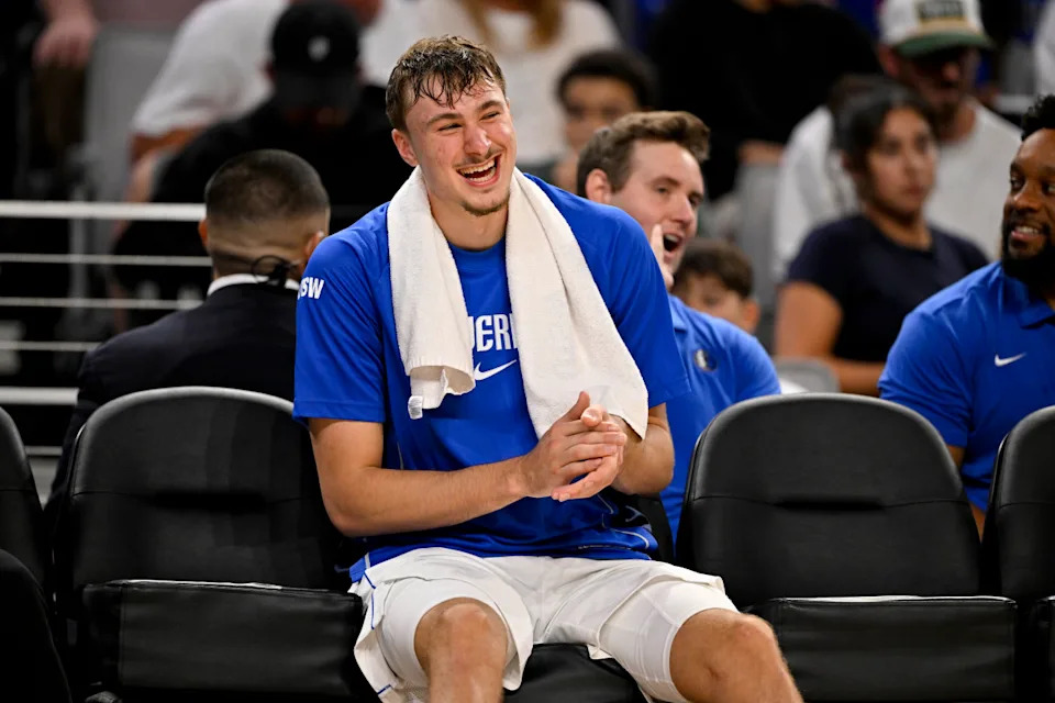 Dallas Mavericks forward Cooper Flagg (32) looks on from the team bench. Credit: Jerome Miron-Imagn Images